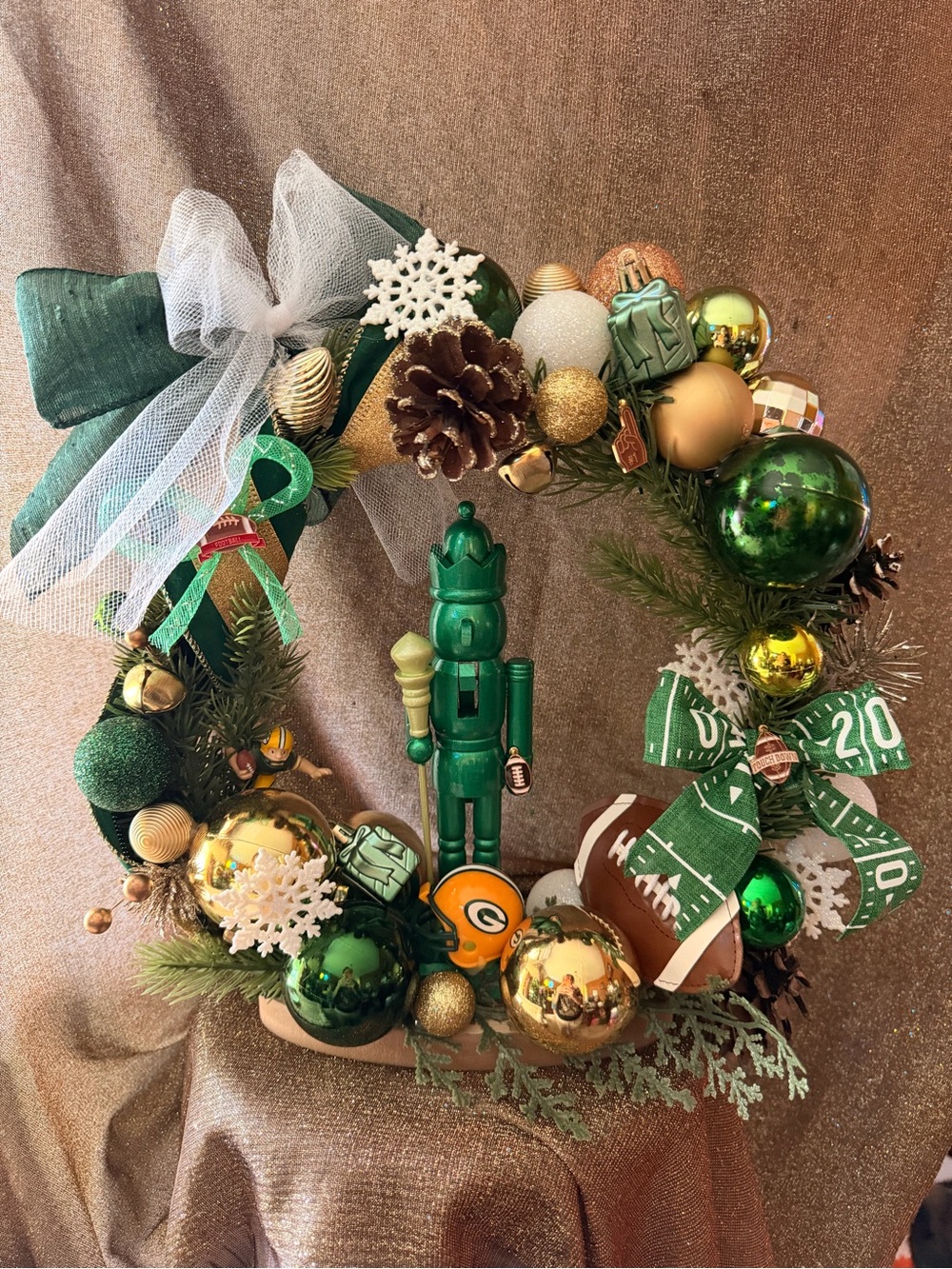 Green and Gold Holiday Wreath with Nutcracker Accent - table centerpiece